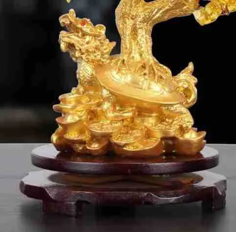 Citrine-coloured small water turtle money tree Feng Shui ornament made of resin.