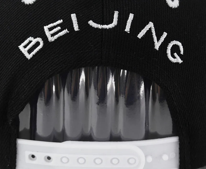 Cotton baseball cap with embroidered letters in adjustable dome crown style