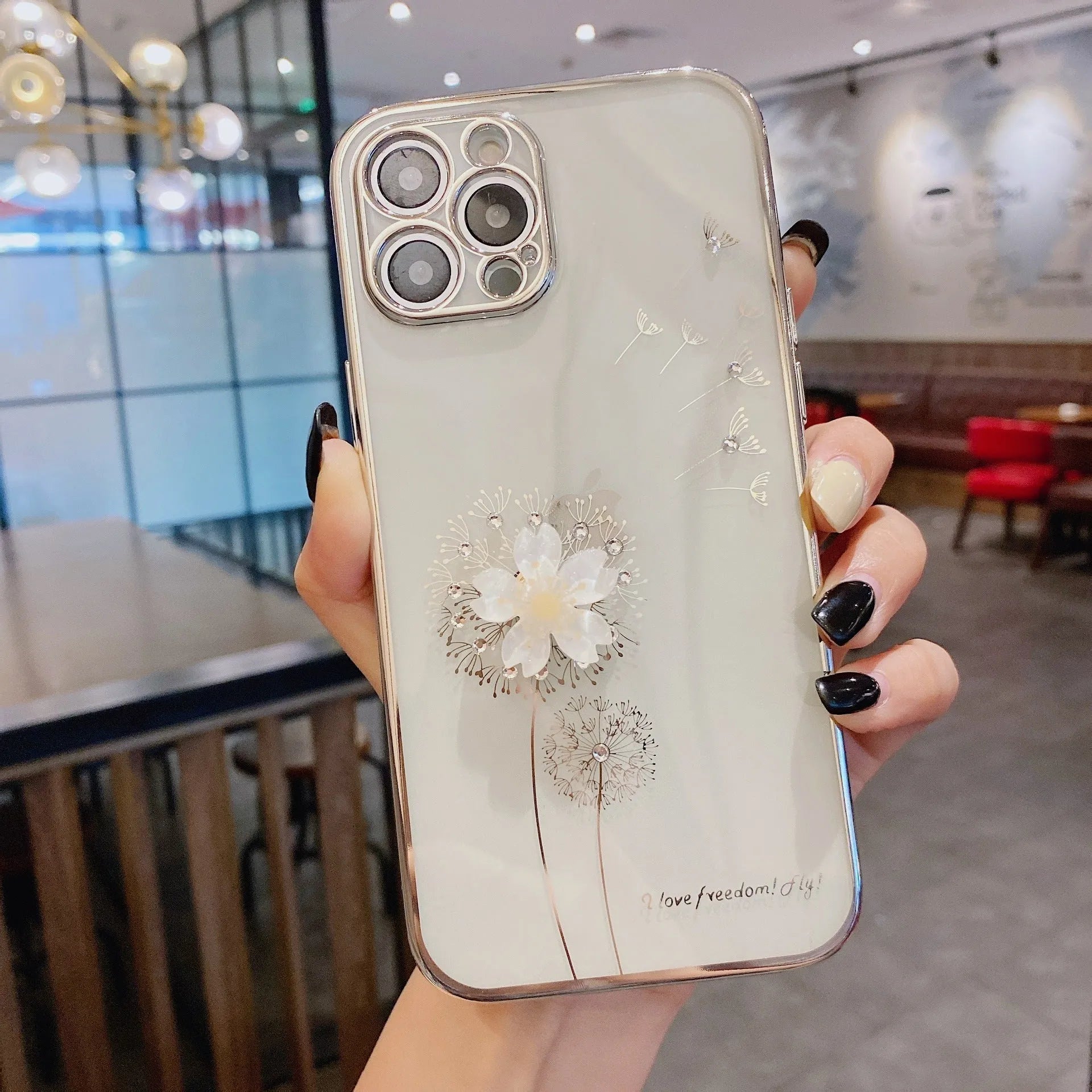 Green iPhone case with a 3D floral spin stand on the back and a built-in screen protector.