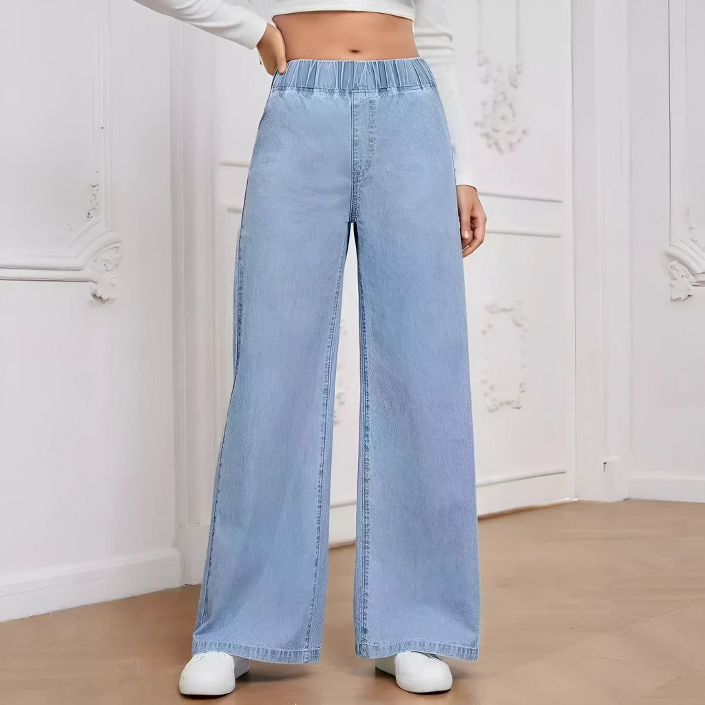 Light blue washed wide-leg jeans on a hanger, showing the straight-leg silhouette and mid-waist design.