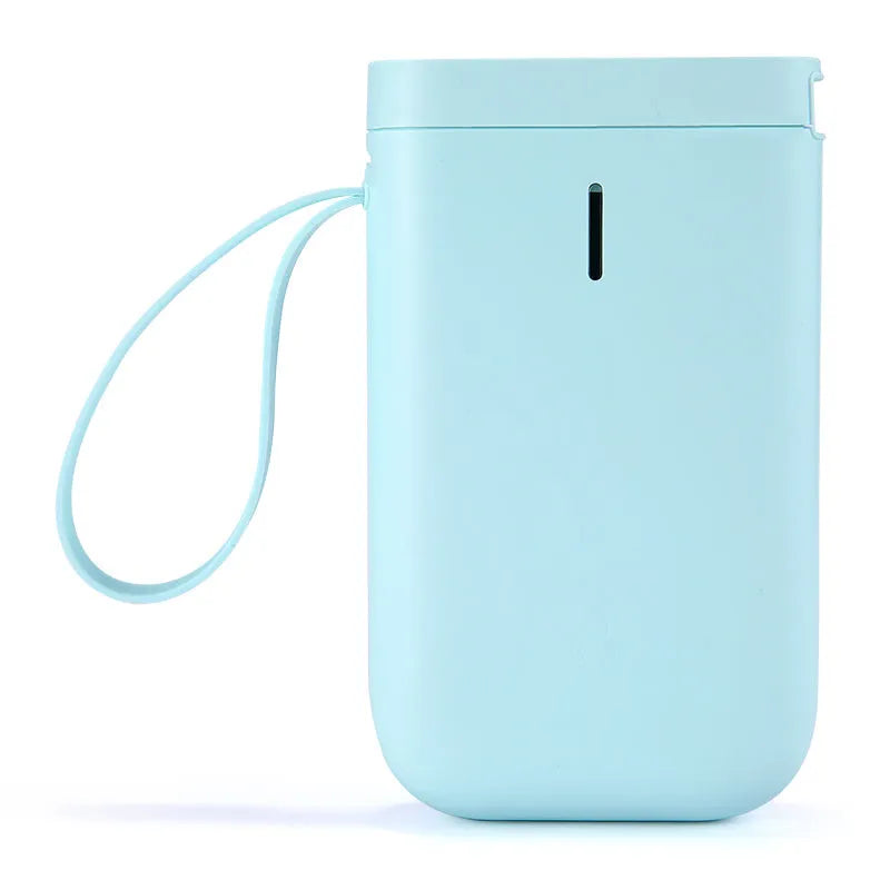 D11 compact white Bluetooth thermal label printer with USB cable and roll of label paper on a desk.