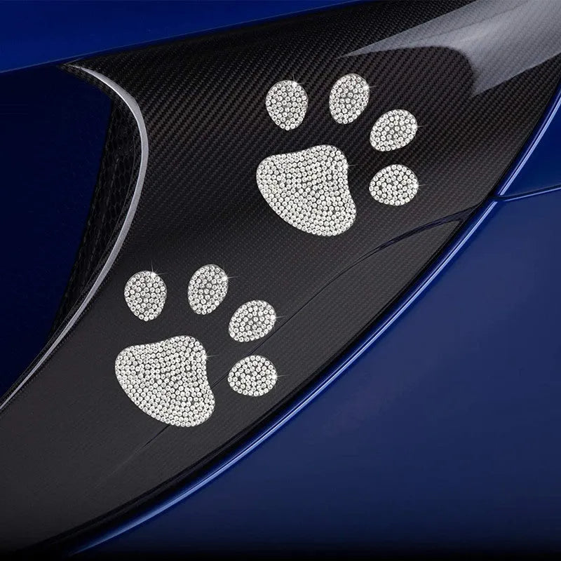 Close-up of white diamond series glass car sticker featuring butterfly and bear paw design measuring 7cm by 6cm