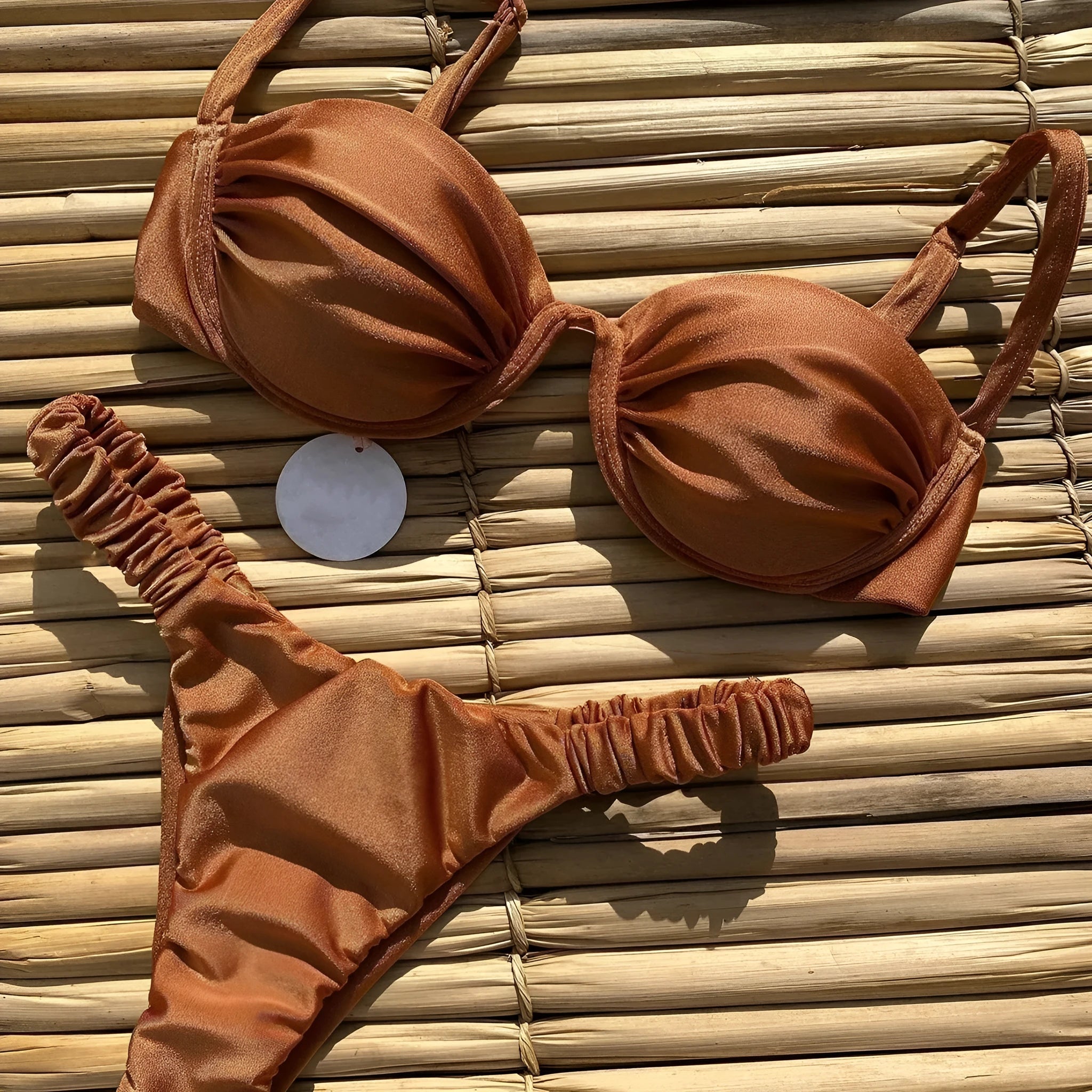 Women's black underwire bikini swimsuit with briefs style on a mannequin.