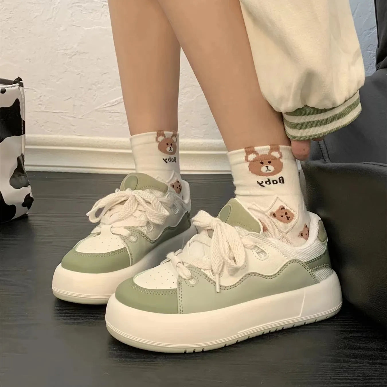Green women's casual shoes with PU mesh upper, flat heel, and round toe.