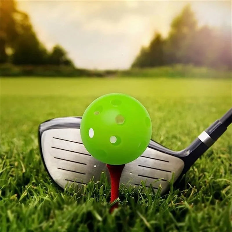 Multi-colour 42mm PE golf practice balls with 26-hole design in net pocket