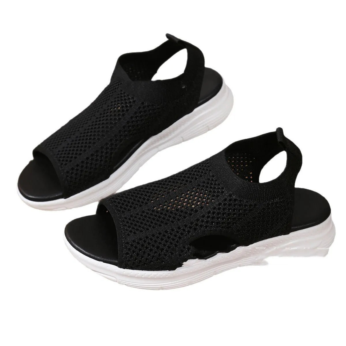 Women's flat black platform sports sandals with mesh lining and a thick rubber sole.