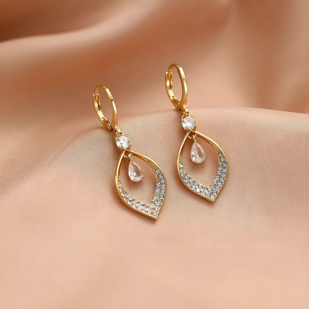 Copper tear-drop shaped earrings with zircon detailing and tassel finish, showing gold and silver electroplated buckle options