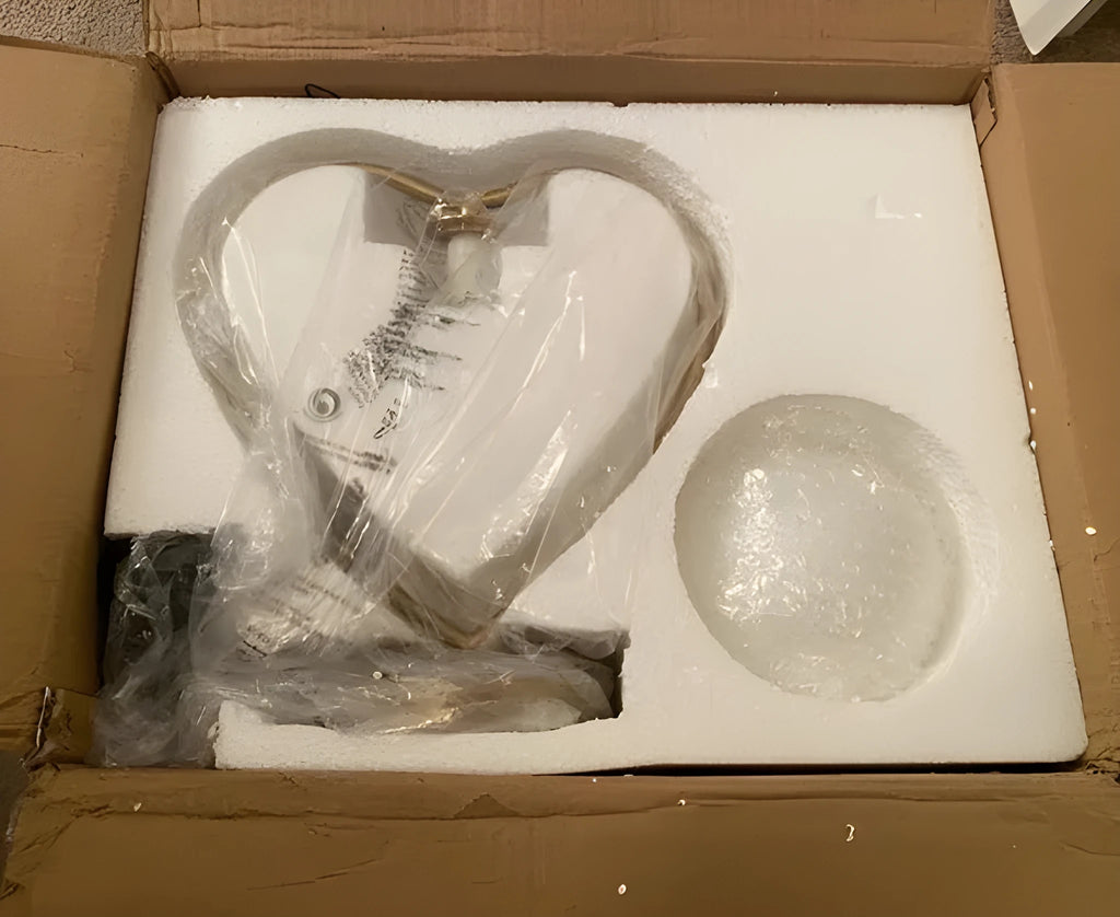 Heart-shaped decorative LED lamp with transparent acrylic detail emitting warm white light