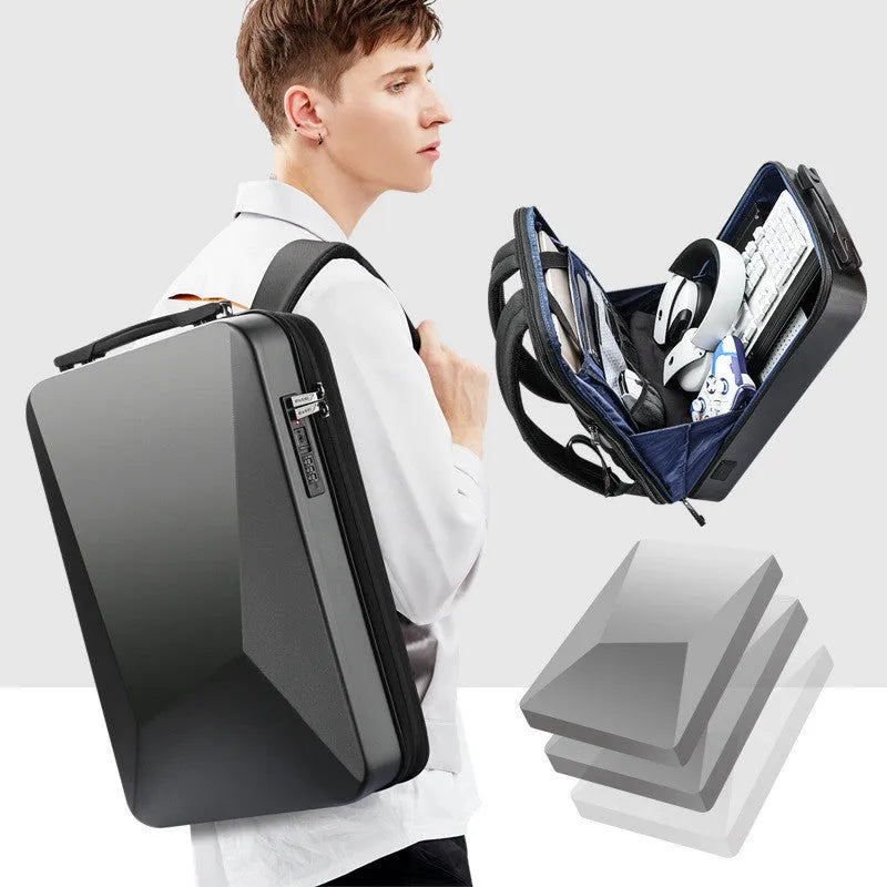 Men's PC hard shell gaming backpack in black, showing front view with straps and urban style design.