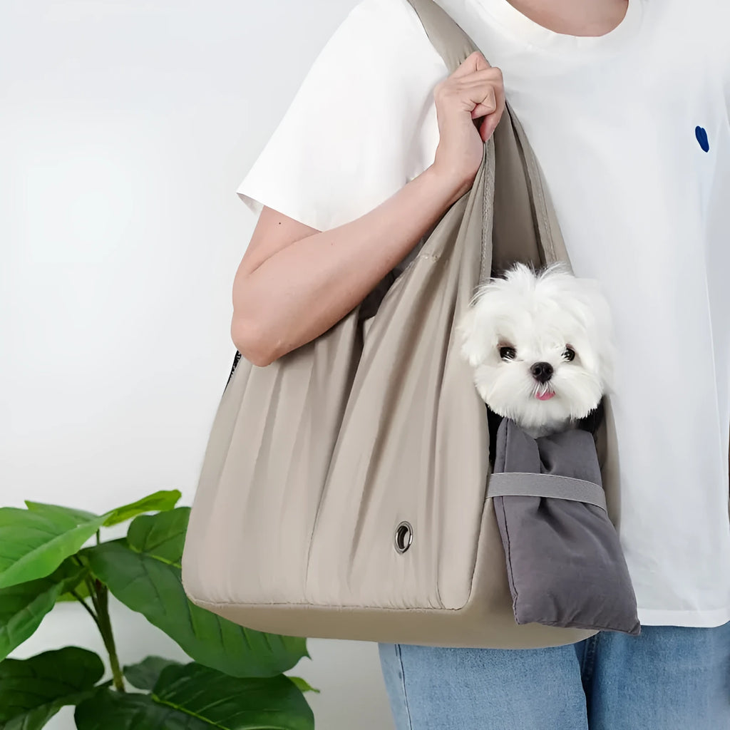 Apricot coloured cloth pet handbag with breathable mesh, shown with dimensions 41cm by 16cm by 28cm