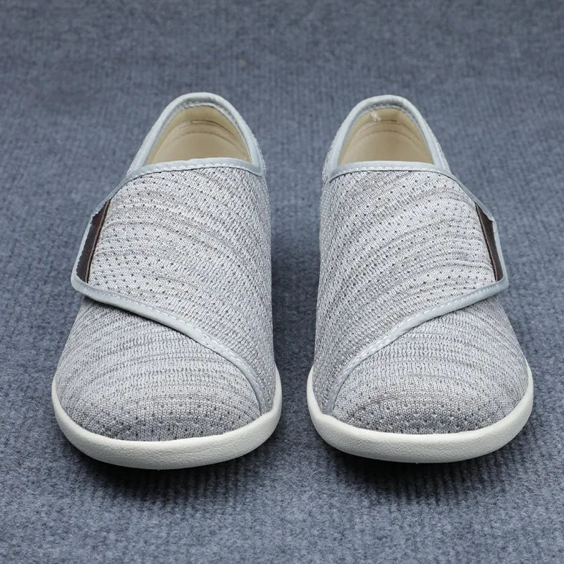 Beige leisure shoes with velcro fastening and widened round toe design