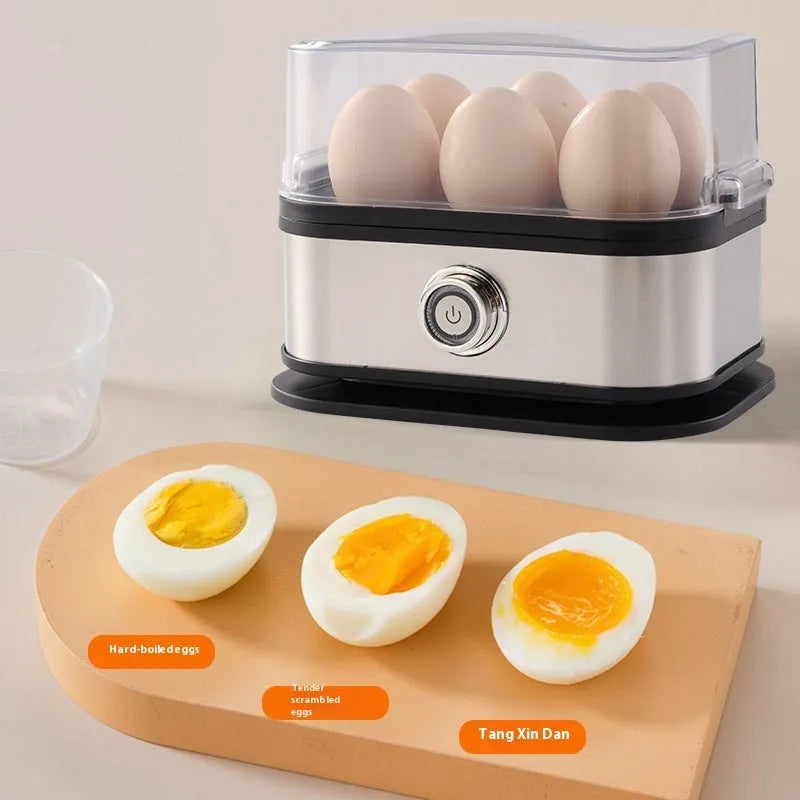 Black stainless steel portable egg boiler with a carry belt.