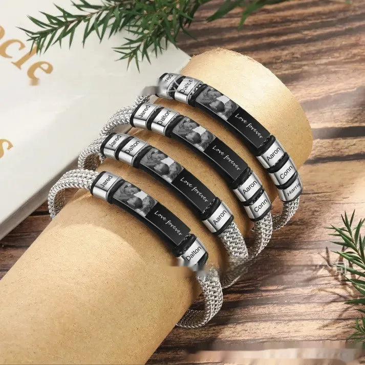 Men's titanium steel and leather rope bracelet with a heart-shaped lettering bead in a gift box.