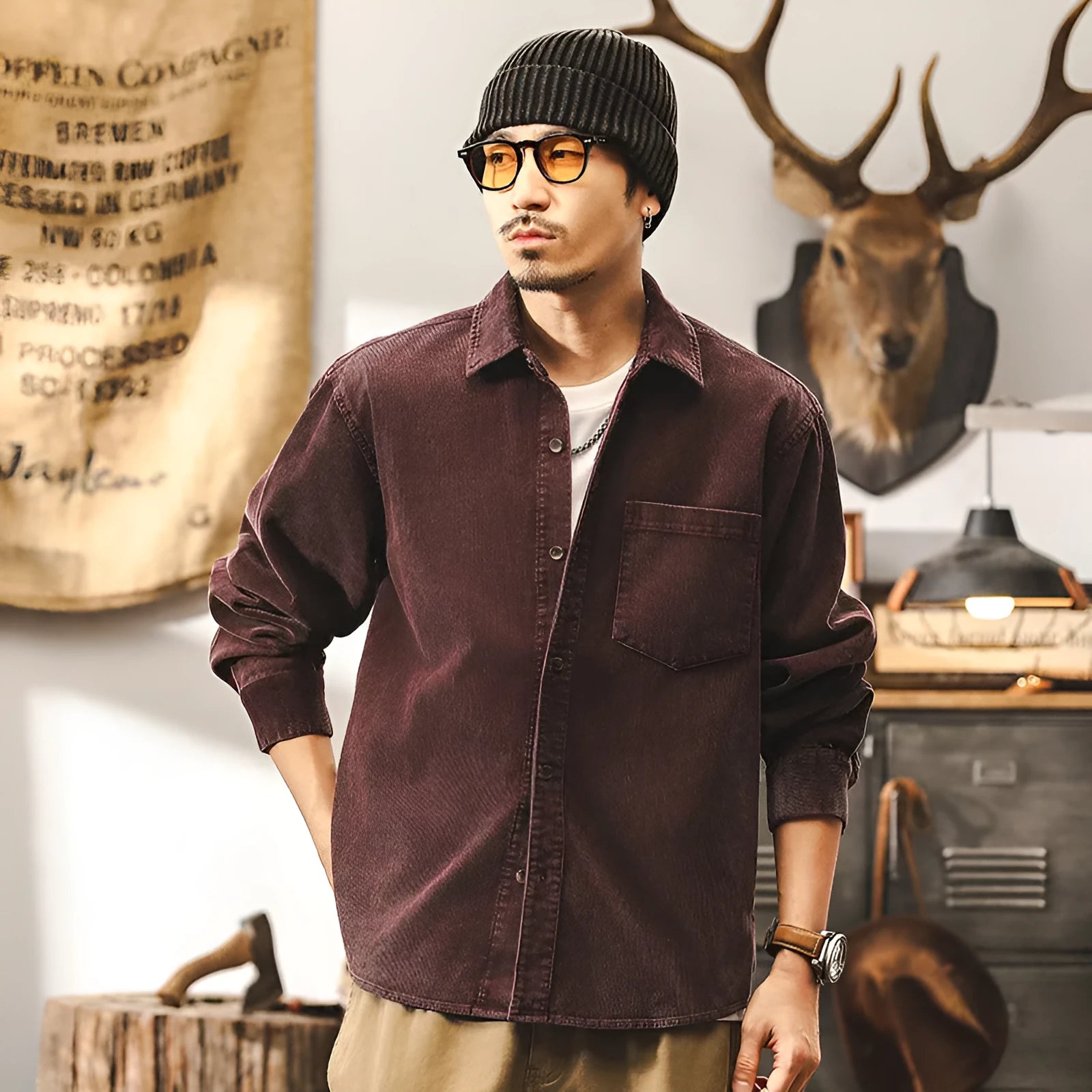Men's red loose-fit corduroy style casual shirt jacket with long sleeves.