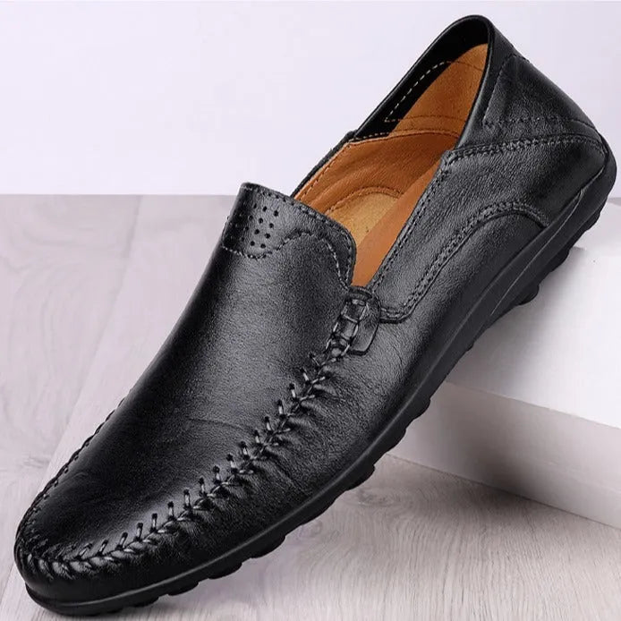 Men's cowhide leather shoes in business casual style with round toe and flat rubber sole