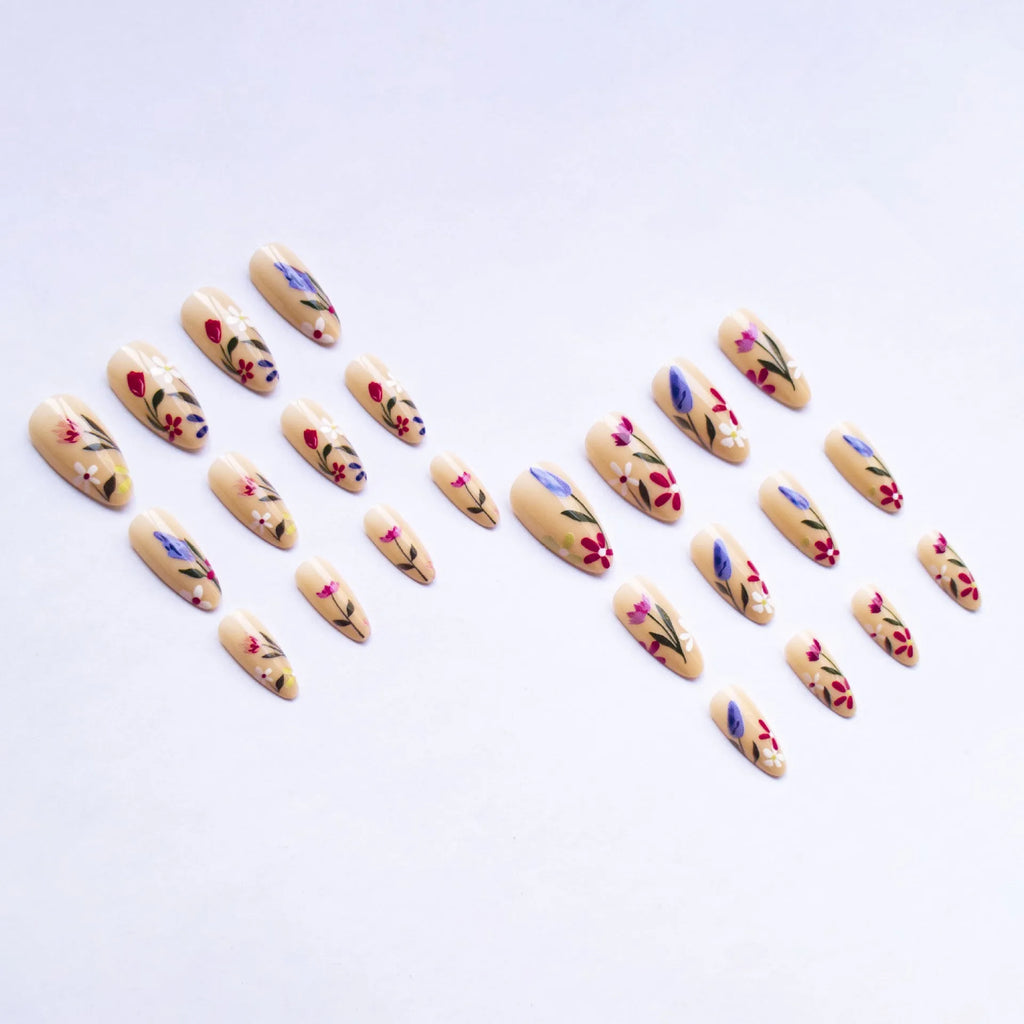 Almond-shaped removable nail art with floral patterns including roses and tulips