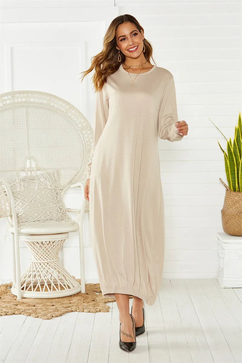 Loose long black lantern dress with a lace-up crew neck, showcasing a casual pullover style.
