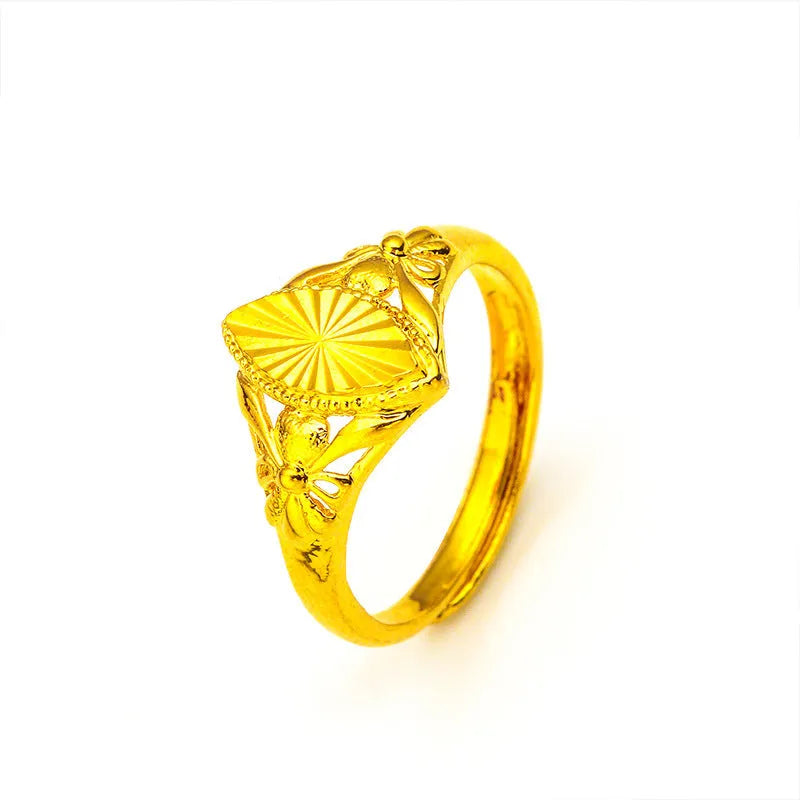 Gold electroplated brass ring with open diamond flower design and alluvial texture pattern