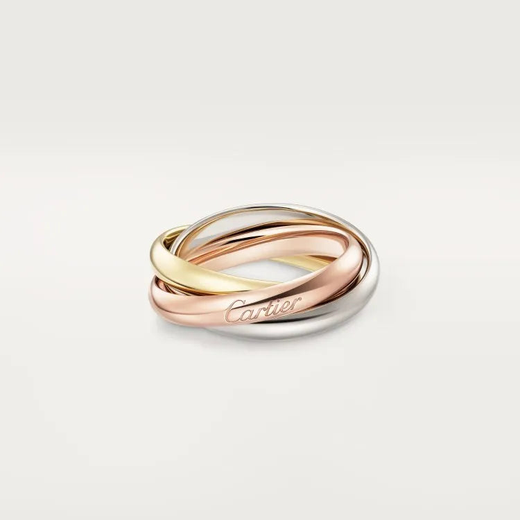 A pair of matching sterling silver U-shaped geometric couple rings with diamond accents on a black background.