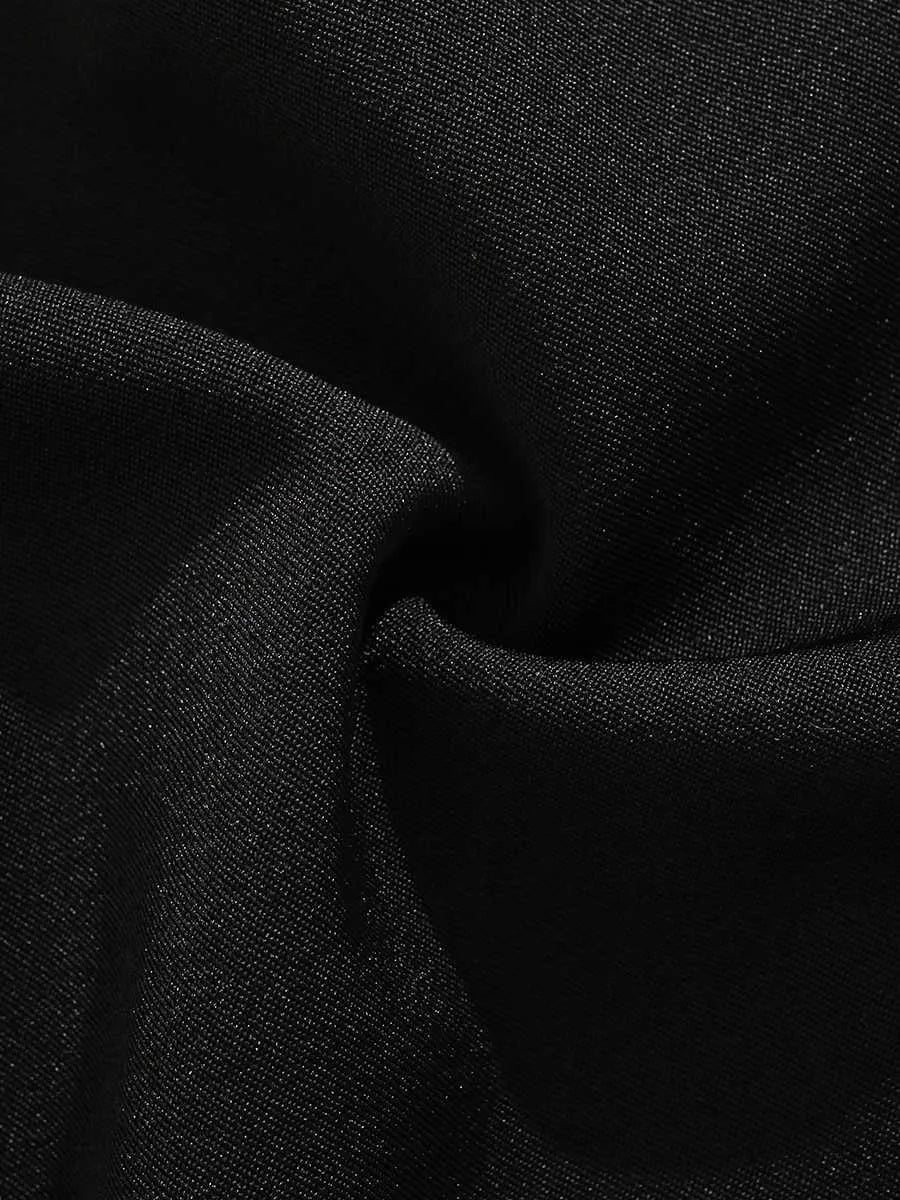 Men's black loose-fit semi-elastic casual shorts with button and zip fly, shown above the knee.