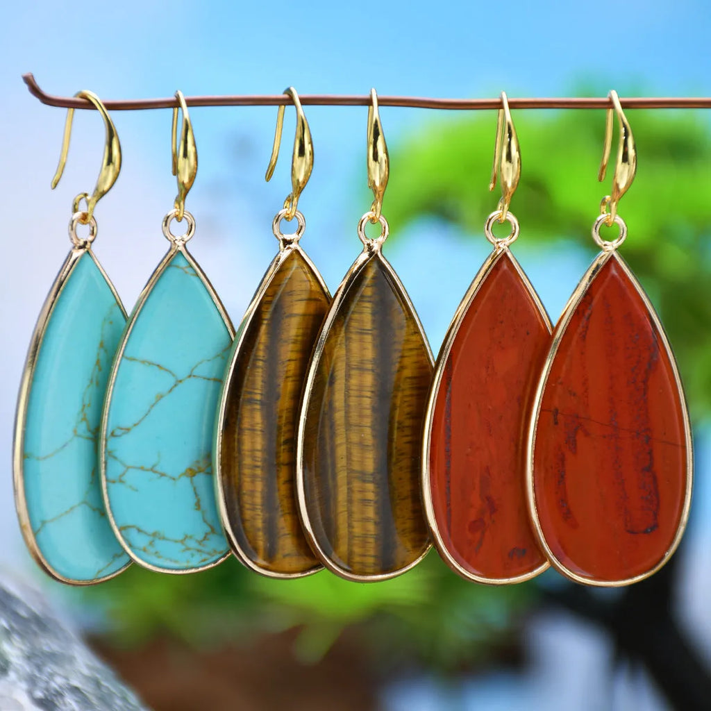 Vintage long water drop earrings in Tigereye stone, showing handmade retro design.