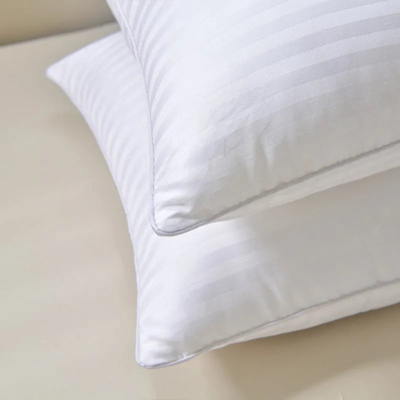 White cotton satin stripe pillow with feather and cotton fill, shown in three different sizes.