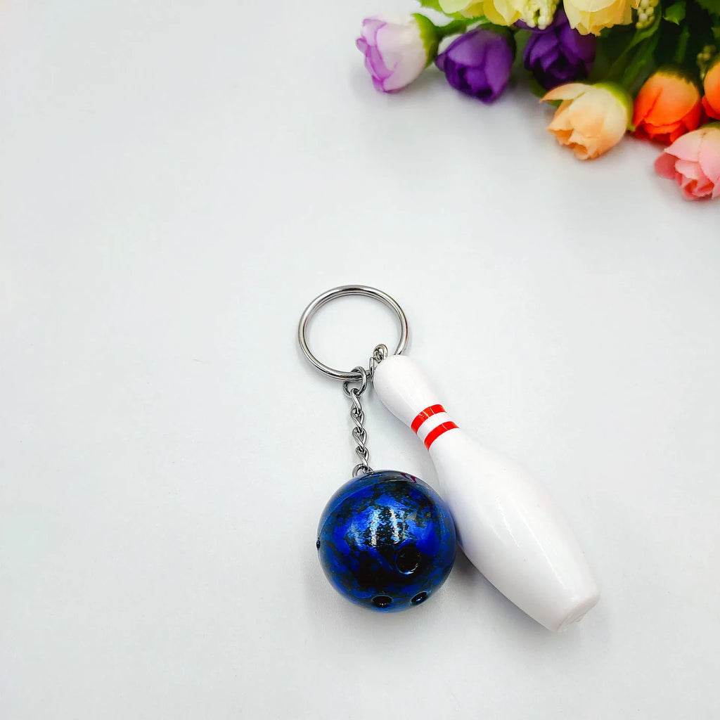 Miniature bowling ball keychain pendant in choice of four colours with key ring attachment