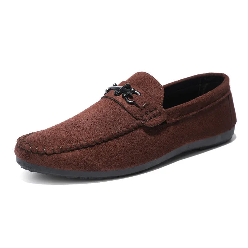 Men's black and brown waterproof slip-on loafers with round toe and rubber sole.