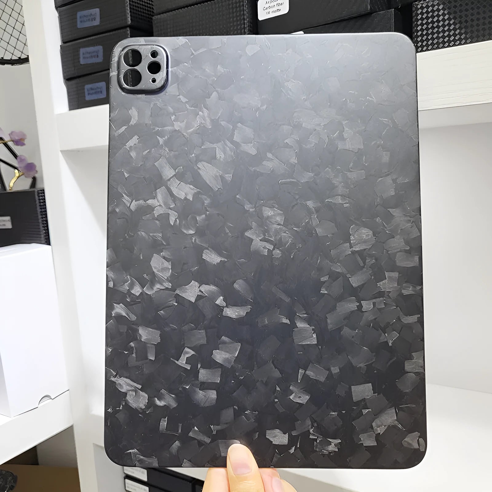 Real carbon fibre hard protective case for Apple iPad Pro 11 tablet in a flat design.