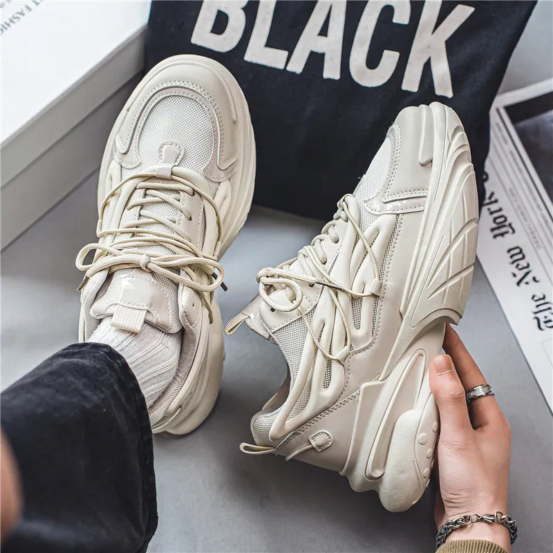 Men's beige mesh sneaker with PU leather upper and rubber sole showing lace-up front design